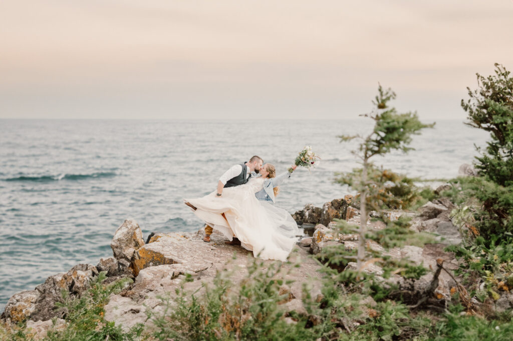 A North Shore groom dipped his bride and kissed her.