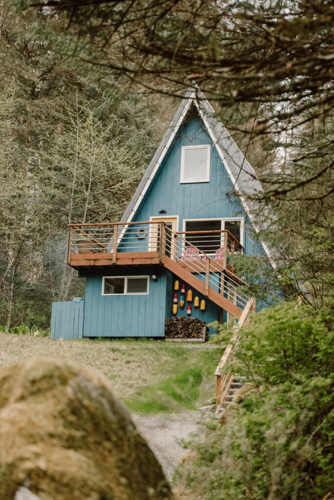 Alaska a-frame airbnbs sit in the forest