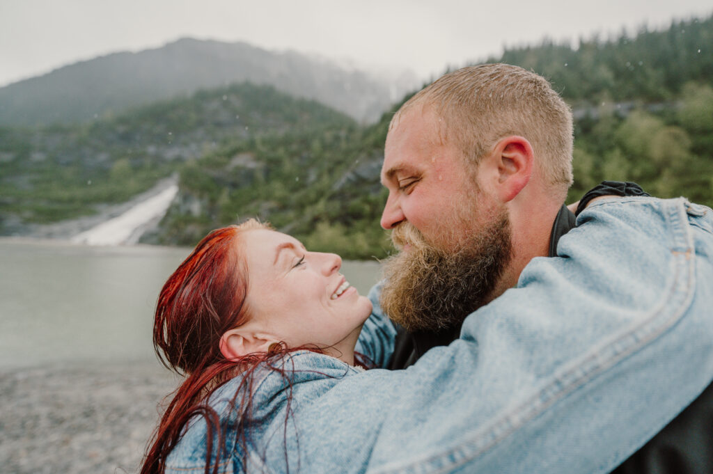 woman and man hugged and smiled at each other