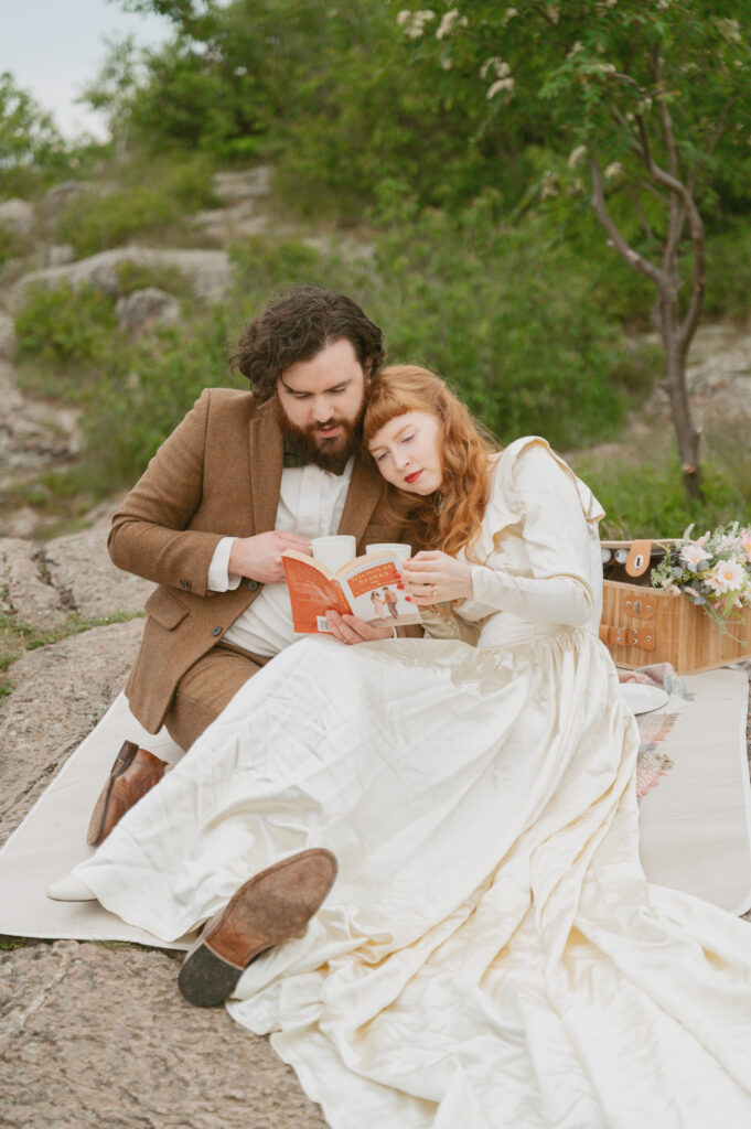 Couples cuddle and read the book