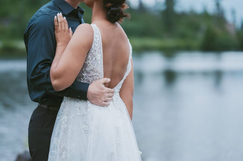 Adventure elopement couple cuddled