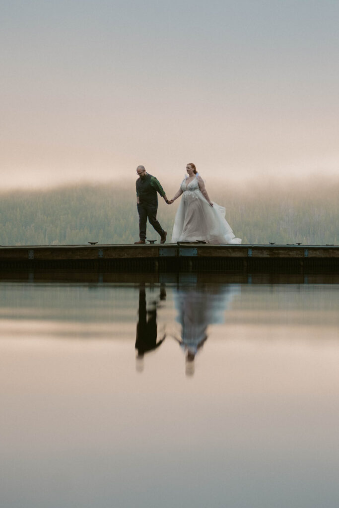 Lake Crescent Elopement couple walk on the dock
